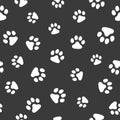 Vector, seamless pattern. Abstraction,, white traces of paws of a cat, dog on a dark gray background. For prints, packaging, Royalty Free Stock Photo