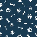 Vector, seamless pattern. Abstraction, white traces of paws of a cat, dog, fish bones on a dark blue background. For printing,