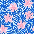 Vector seamless pattern in applique style with tropical palm leaves and flowers