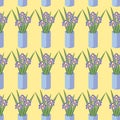 Vector seamless pattern with bouquets of iris flowers in blue vase. Royalty Free Stock Photo