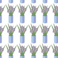 Vector seamless pattern with bouquets of iris flowers in blue vase. Royalty Free Stock Photo