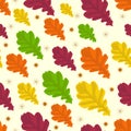 Seamless pattern with autumn oak leaves. Multi-colored vector ornament on yellow for textiles, paper, plastic and web pages