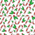 Vector seamless pattern. Candy canes and holly berry. Christmas wrapping paper design. White background