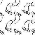 seamless pattern of children's legs. vector patterns of small feet, hand-drawn in doodle style, isolated black outline Royalty Free Stock Photo