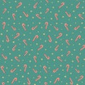 Vector seamless pattern with christmas candy canes and golden stars at blue background Royalty Free Stock Photo