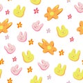 Vector seamless pattern with colorful easter rabbit biscuits .