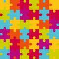 Vector seamless pattern of colorful jigsaw puzzle pieces. Royalty Free Stock Photo