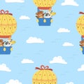 Vector seamless pattern with cute animals in hot air balloon and clouds. Holiday repeating background with adorable flying