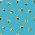 Vector seamless pattern with cute cartoon bees and flowers on a blue background. Royalty Free Stock Photo