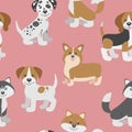 Vector seamless pattern with cute cartoon dog puppies. Royalty Free Stock Photo