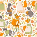 Vector seamless pattern with cute hand drawn cartoon raccoons, foxes, autumn leaves and branches isolated on white background. Royalty Free Stock Photo