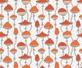 Vector seamless pattern with cute red fly-agaric amanita mushrooms.