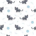Vector seamless pattern with cute striped cat silhouettes. Royalty Free Stock Photo
