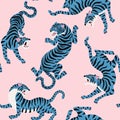 Vector seamless pattern with cute tigers on background. Circus animal show. Fashionable fabric design.