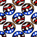 Vector seamless pattern of a donut with icing with the symbols of the US flag, white stars on a blue background and red Royalty Free Stock Photo