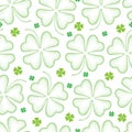 Vector seamless pattern with dotted lucky four leaf clover or shamrock in green on the white background. Holiday background. Royalty Free Stock Photo