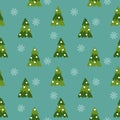 Vector Seamless pattern. Green Christmas trees and falling snowflakes on a blue background. Royalty Free Stock Photo