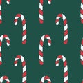 Vector seamless pattern with hand drawn christmas candies on dark green background Royalty Free Stock Photo