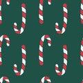 Vector seamless pattern with hand drawn christmas candies on dark green background Royalty Free Stock Photo