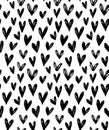 Vector seamless pattern with hand drawn doodle black small hearts.