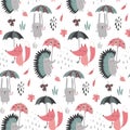 Vector seamless pattern with hand drawn wild forest animals with umbrellas, fall leaves.