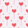 Vector seamless pattern with heartshaped lollipops