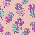 Vector seamless pattern of lollipop candies on a light pink background Royalty Free Stock Photo