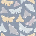 Seamless pattern with colorful moths and blue background