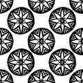 Vector seamless pattern of a multibeam star in a circle drawn by hand, with a black line on a white background. seamless pattern Royalty Free Stock Photo