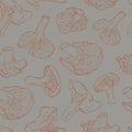 Vector seamless pattern with mushrooms on a grey background.