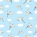 Vector seamless pattern with oriental motifes. Cranes flying. Flower blossom. Royalty Free Stock Photo