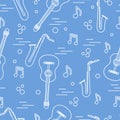 Seamless pattern with saxophones, notes, guitars. Musical instruments Royalty Free Stock Photo