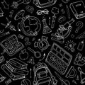 Vector seamless pattern of school supplies on black