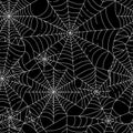 Halloween spider web seamless pattern. Black hand-drawn cobwebs crossing on white background. Repeating backdrop for textile, Royalty Free Stock Photo