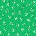 Vector seamless pattern with small pretty white flowers on green. Liberty style