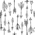 Vector seamless pattern with tribal arrows Royalty Free Stock Photo