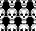 Vector seamless pattern of white sugar skull with ethnic ornament on black background Royalty Free Stock Photo