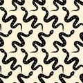Vector seamless patterns with black snakes. Repeated glyph snakes on yellow backdrop Royalty Free Stock Photo