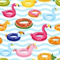 Vector seamless swimming pool float rings pattern. Multicolor inflatable cute kids toys and striped background.