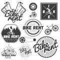 Vector set of bicycle labels in vintage style. Bike rent shop. Royalty Free Stock Photo