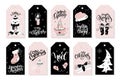 Vector set of christmas greeting tags with hand lettering phrases and decorative elements and characters