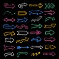 Vector set of colorful arrows. Hand-drawn, doodle elements isolated on black background. Royalty Free Stock Photo