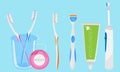 Elements for dental care and healthy teeth, toothbrush, toothpaste, dental floss, tongue cleaner and oral irrigator. Royalty Free Stock Photo