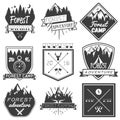 Vector set of forest camp labels in vintage style. Design elements, icons, logo, emblems and badges isolated on white