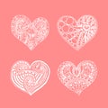 Vector set of four doodle hand drawn white hearts