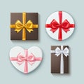 Vector set of gift boxes different forms with ribbons and bow-knots isolated on background, top view Royalty Free Stock Photo