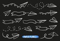 Vector set of linear paper airplanes. Hand-drawn, doodle elements isolated on white background. Royalty Free Stock Photo