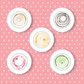 Vector set of plates with colorful sauces on pink polka table cloth. Decorativ tasty sauces