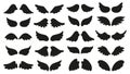 Vector set of silhouettes wings. Hand-drawn, doodle elements isolated on white background. Royalty Free Stock Photo