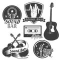 Vector set of sound recording studio labels in vintage style. Rock music instruments, cassette tape, guitar on Royalty Free Stock Photo